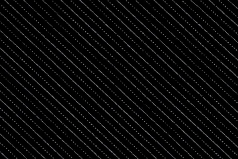 Black material with lines, a background or texture Stock Photos