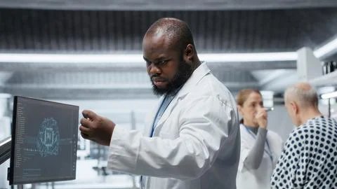 Black medic using artificial intelligence to observe effect during new drug test Stock Photos