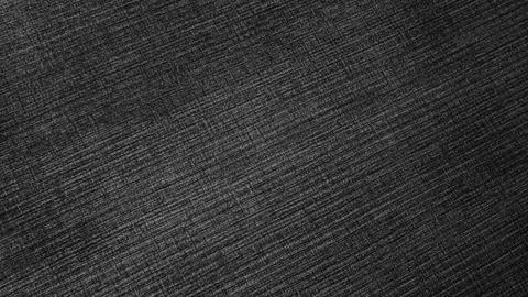 Black melange textile background with diagonal structure Stock Photos