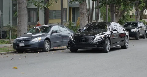 Black Mercedes S Class - Pulls up to Franklin Ave. (4K, Steadicam, Slow Motion) Stock Footage 91223124
