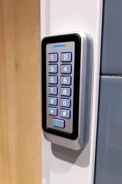 Black metal electric code lock with the digital keypad and card access Stock Photos