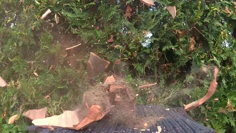 A black metal hammer crashed into an empty ceramic flower pot. Slow motion Stock Footage 113570580