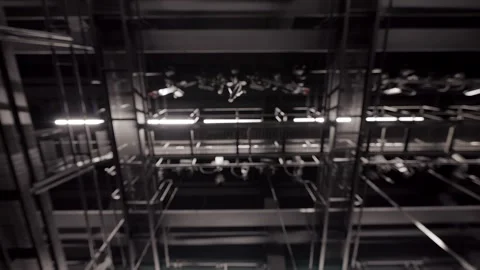 Black Metal Hook is Lifted Into the Ceiling. Several Hoists Working. Stock Footage 302761084