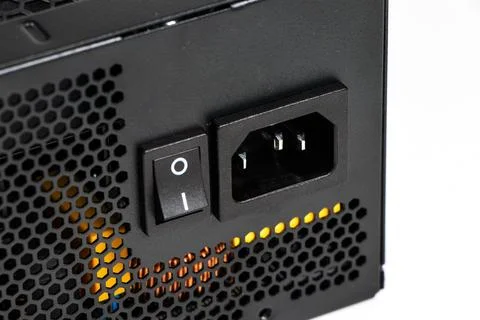 Black metal power source of computer isolated on the white background. Fotos Stock