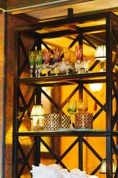 Black Metal Tableware Rack in Dining Room or Restaurant. Stock Photos