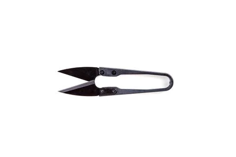 Black metal thread snips top down over white Stockfoto's