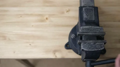 Black metal vise in the workshop, bench tool close-up. They're closing. The view Stock Footage 149613751