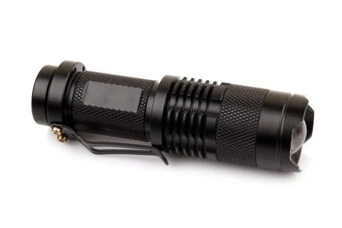 Black metallic flashlight isolate on white background Stock-Fotos
