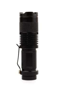 Black metallic flashlight isolate on white background. Stock Photos