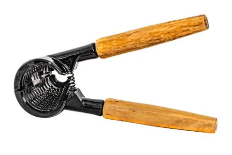 A black metallic nuts forceps with yellow wooden handles isolated on a white Stock Photos