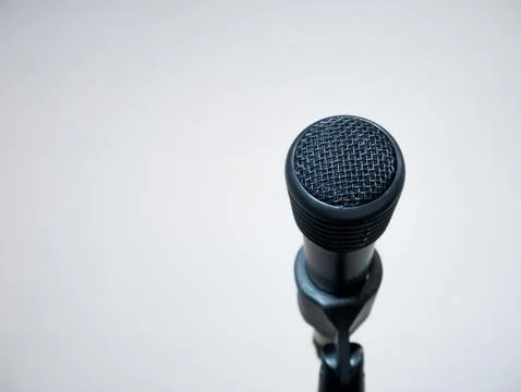 Black microphone on stand in studio Stock Photos