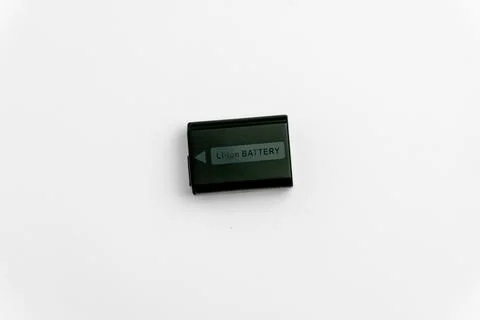 Black mirrorless camera replacement battery isolated on white Stock Photos