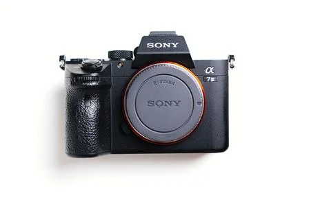 Black mirrorless Camera Sony on a white background. Foto stock