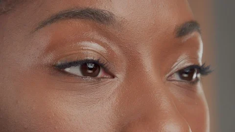 Black mixed race model on beige background with natural neutral makeup Stock Footage 101189323
