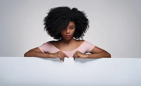 Black model with banner pouting lips Stock Photos