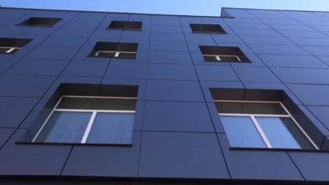 Black modern building. Smooth camera span Stock Footage 134379230
