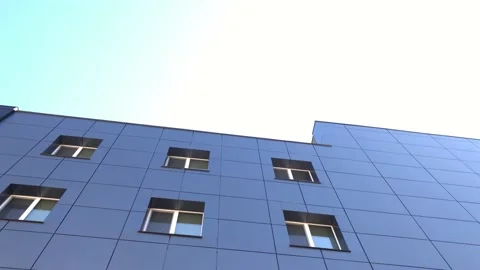 Black modern building. Smooth camera span Stockbeeldmateriaal 134379312