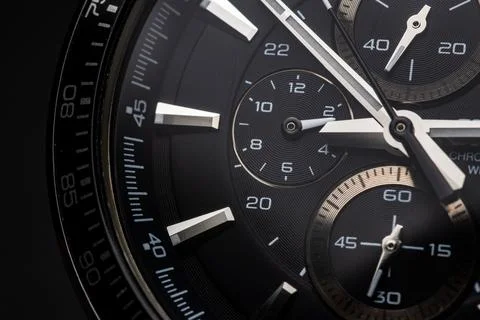 Black modern clock face. close up background Stock Photos