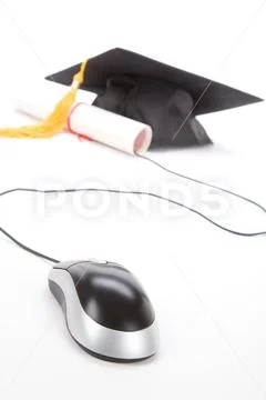 Black Mortarboard and computer mouse Stock Photos