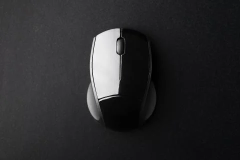 Black Mouse on Black Surface Stock Photos