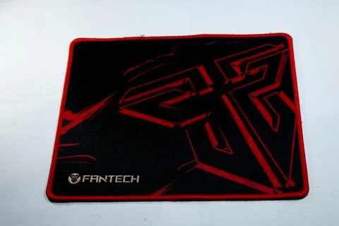 Black Mouse Pad with Red Accent on White Background Stock Photos