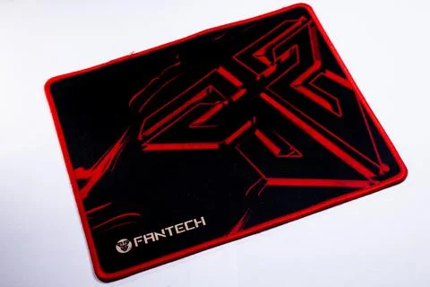 Black Mouse Pad with Red Accent on White Background Stock Photos