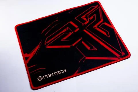 Black Mouse Pad with Red Accent on White Background Stock Photos
