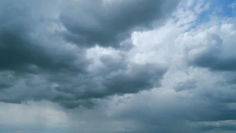 Black moving storm clouds thunderstorms on horizon. Thunderstorm in tropical Video stock 210600266