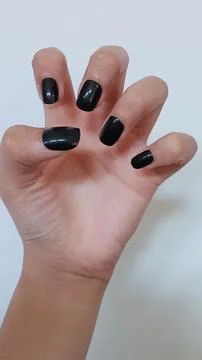 Black nails Stock Photos