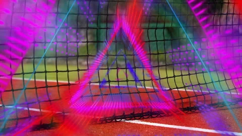 Black net stretching across red court surface, glowing with neon pink purple Stock Footage 307460110