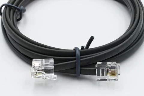 Black network cable isolated on white Stock Photos