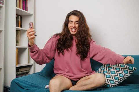 Black non-binary person making poses; ballroom statement sensei mother Pavuna Stock Photos