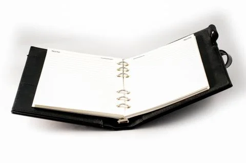 Black note book open Stock Photos