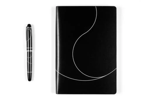 Black notebook with pen Stock Photos