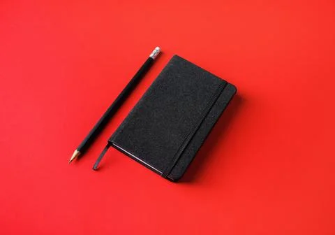 Black notebook, pencil Stock Photos