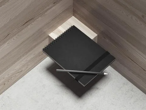 Black notepad and black pen on the wooden background, 3d rendering Иллюстрация