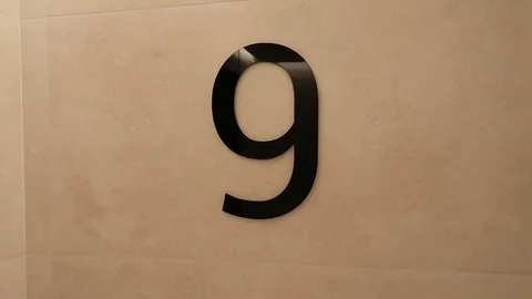 Black number 9 on the wall background Stock-Footage 109503761