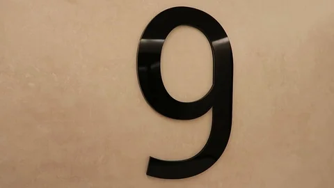 Black number 9 on the wall background, floor marking 스톡 동영상 109503889