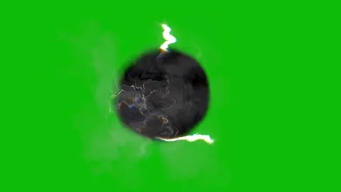 A black object on a green background with smoke Vídeos de archivo 331103639
