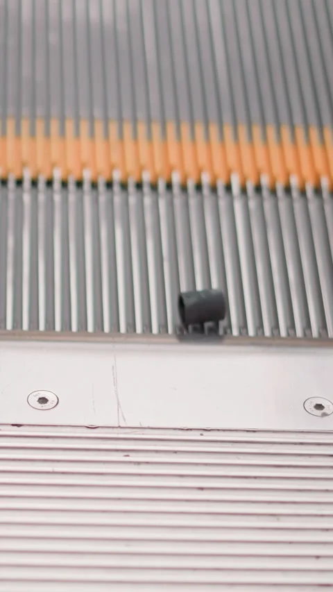 Black Object Rotating on a Moving Elevator with Yellow Markings Video stock 310637668