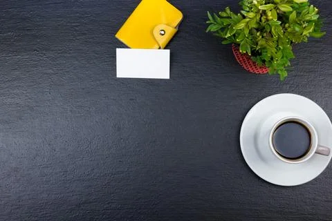 Black Office desk table with computer, pen and a cup of coffee, lot of things Stock Photos