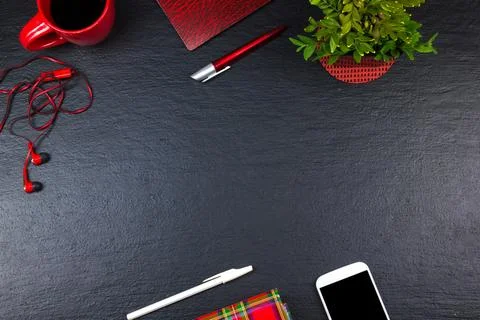 Black Office desk table with computer, pen and a cup of coffee, lot of things Stock Photos