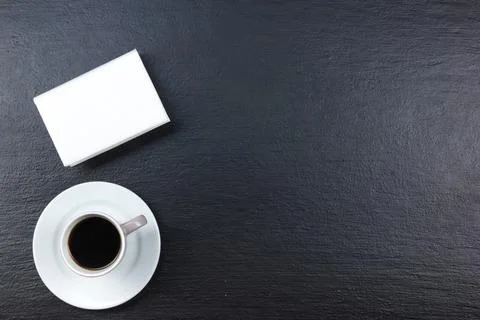 Black Office desk table with computer, pen and a cup of coffee, lot of thin.. Stock Photos