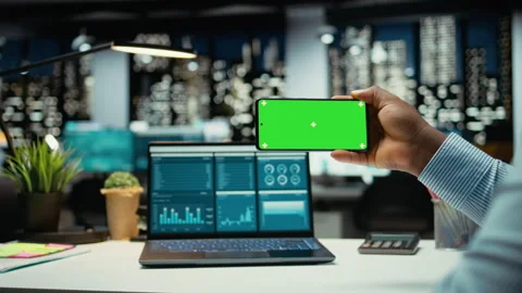 Black office employee working with isolated screen on mobile phone Stock Footage 320086570