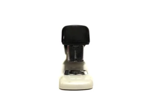 Black office stapler on white background Stock Photos