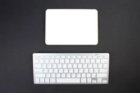 Black office table with computer, pen and a cup of coffee, lot of things. Top Stock Photos