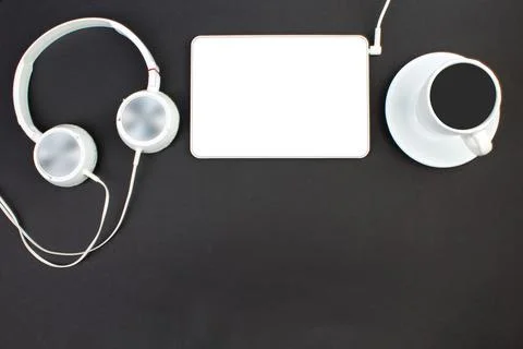 Black office table with computer, pen and a cup of coffee, lot of things. Top Stock Photos