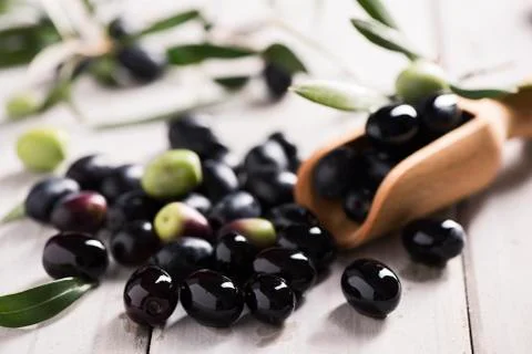 Black Olives on a white table Stock Photos