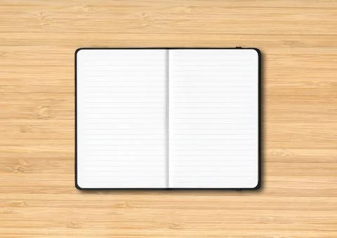 Black open lined notebook isolated on wooden background Stock Photos