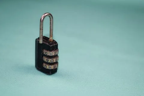 Black padlock with password,pass code on blue background 스톡 사진